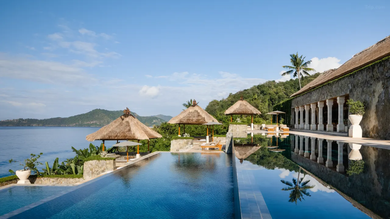 - Bali Adventours Amankila Manggis Bali boutique resort with terraced pools and serene ocean views.