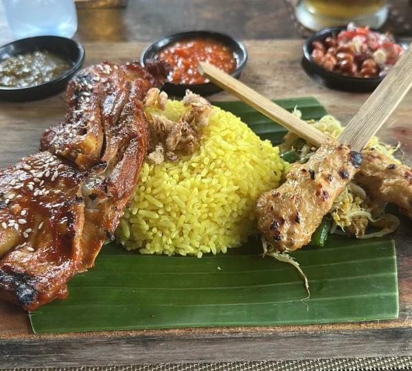 Bali street food tour adventures through local markets or hands-on cooking classes where you learn to make traditional Balinese dishes.