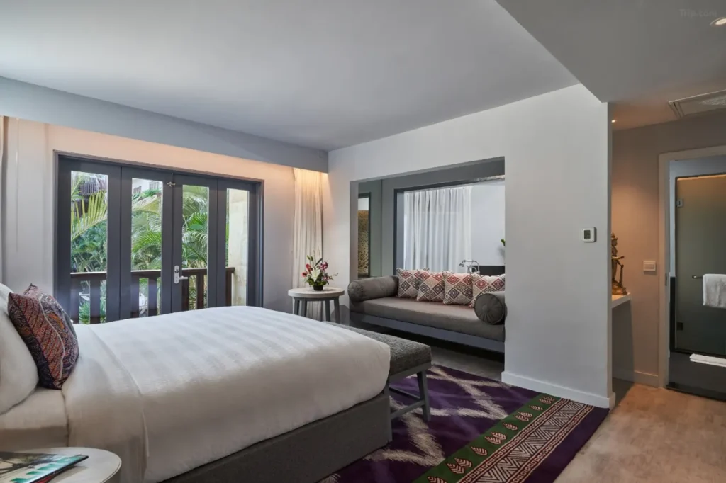 Hard Rock Hotel Bali features its iconic, expansive free-form swimming pool with a sand island. This lively hotel provides reliable late check-out policies, often for a fee.