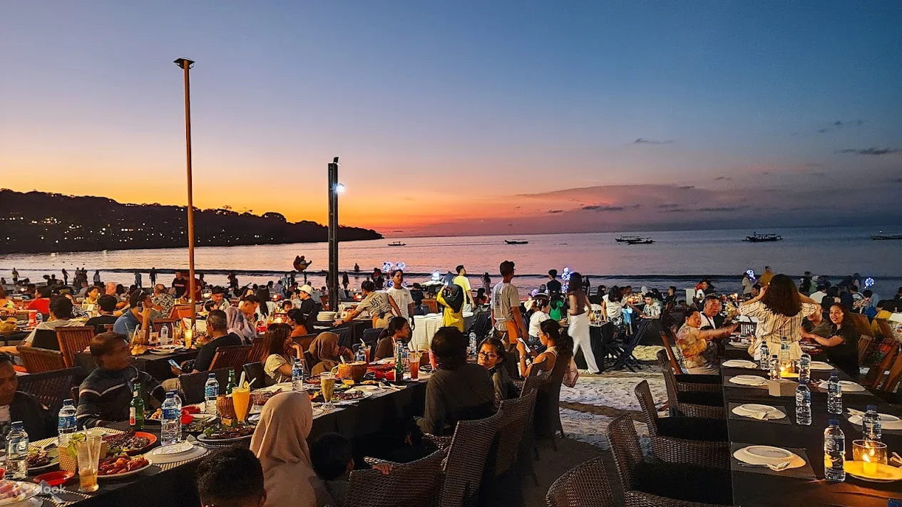 Bali culinary tours group enjoying a meal at a traditional Balinese restaurant, highlighting the island's gastronomy.