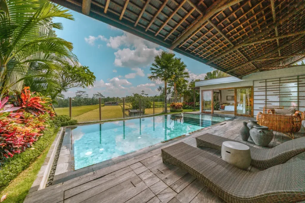 Munduk Moding Plantation Bali infinity pool overlooking lush mountains, perfect for romance and honeymoon deals.