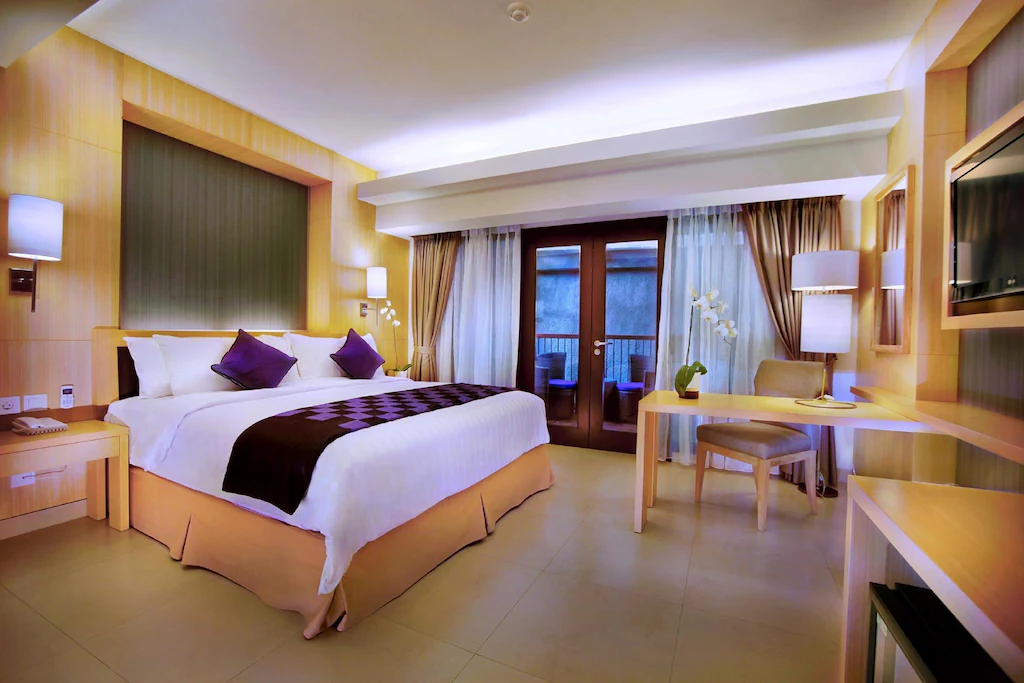 Quest Hotel Kuta by ASTON, stylish and quiet hotel close to Bali Airport for restful short stays.