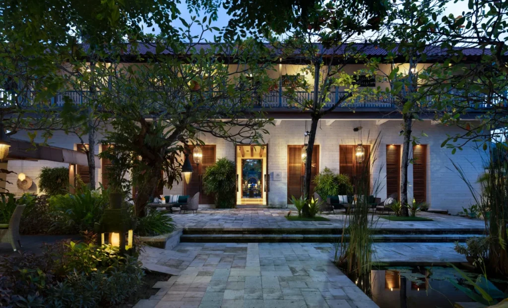 The parking area at Sudamala Resort in Sanur, showing that free parking is available for hotel visitors. The ambiance might reflect Sanur's relaxed atmosphere.