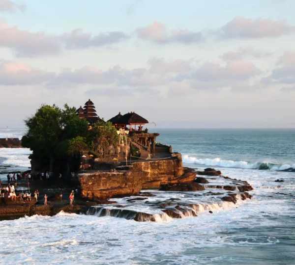 Finding good tours in Bali amidst beautiful scenery, highlighting the best ways to discover authentic Bali experiences and spiritual tours in Tanah Lot.
