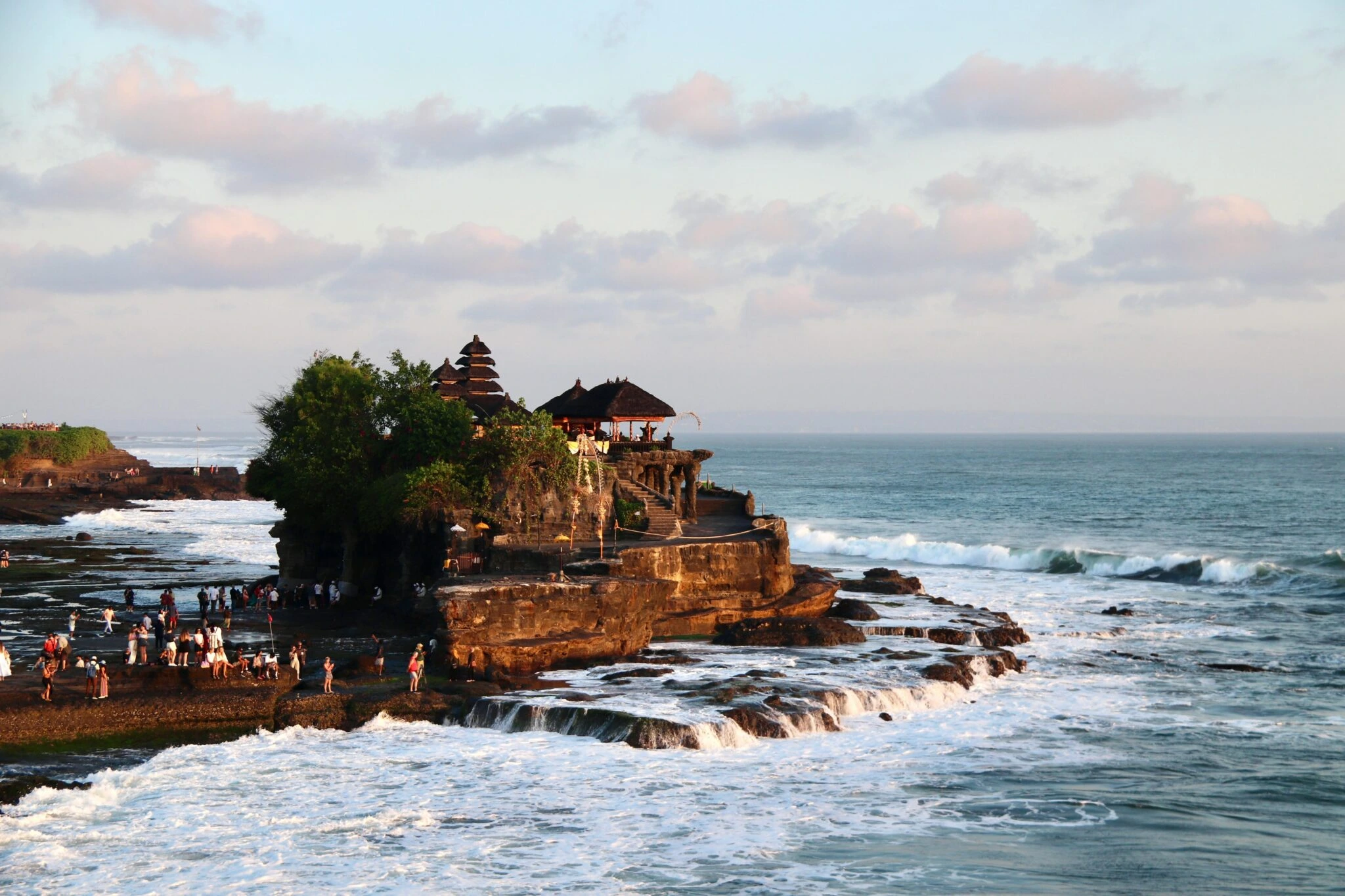 Finding good tours in Bali amidst beautiful scenery, highlighting the best ways to discover authentic Bali experiences and spiritual tours in Tanah Lot.