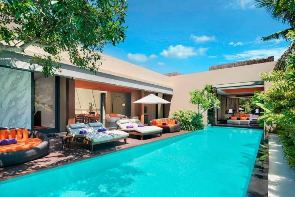 An inviting image showcasing a feature or amenity of a top smoker-friendly hotel in Bali, such as a comfortable outdoor lounge, a balcony with a view, or a designated smoking area, emphasizing its appeal to guests who smoke.