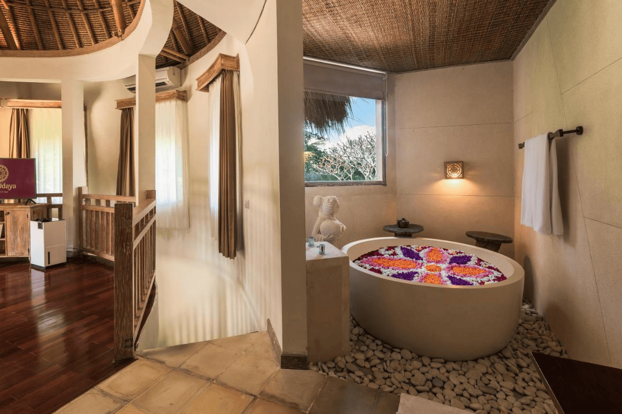 The Udaya Resorts and Spa Ubud Bali, Resort and Hotes with a Jacuzzi, a serene scene depicting the peaceful and intimate experience sought by honeymooners or those who appreciate understated luxury.