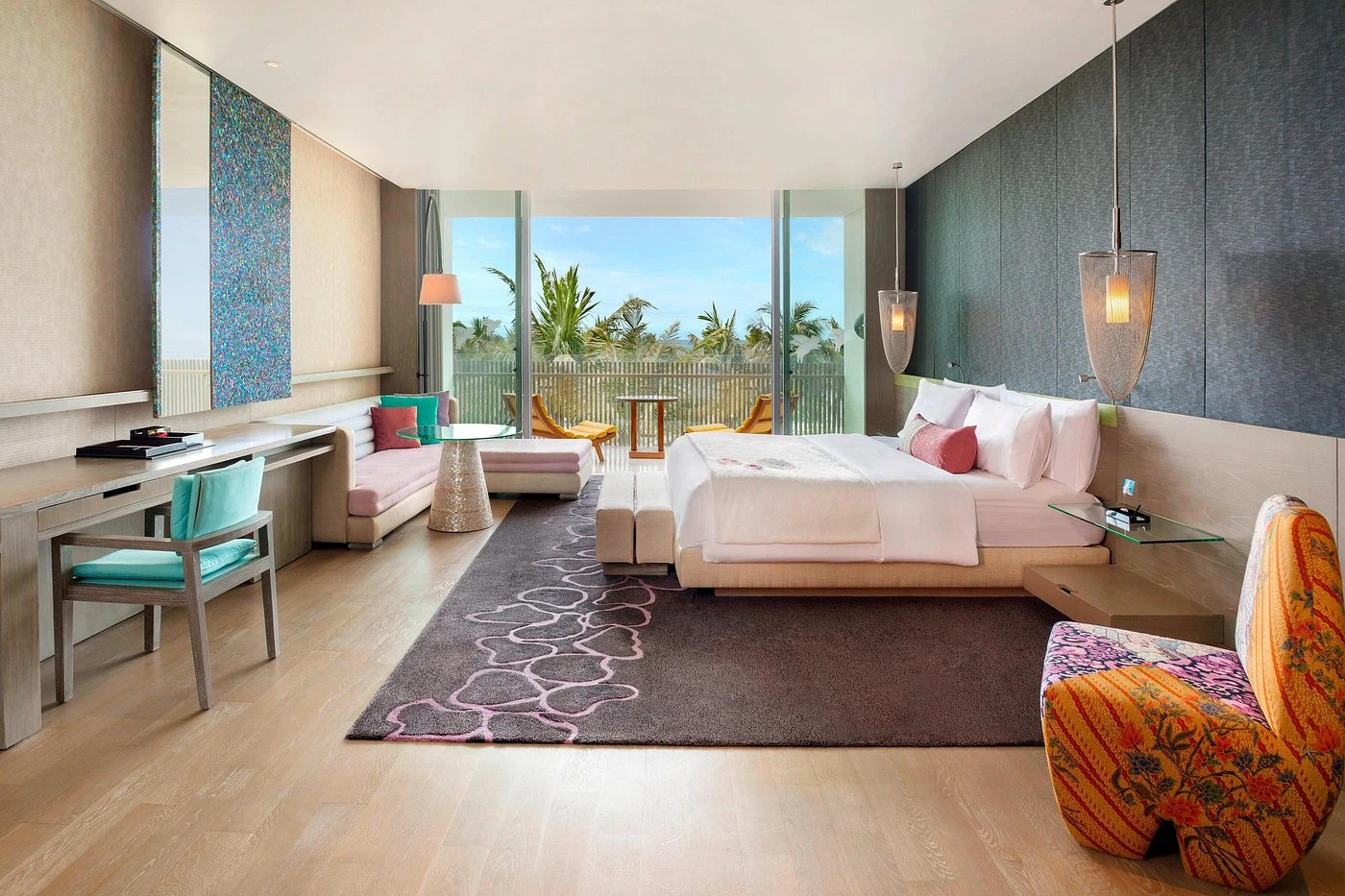 The stylish and vibrant atmosphere of W Seminyak Bali, showcasing its modern design, lively pool area, or a comfortable outdoor space, highlighting its appeal as a smoker-friendly hotel.