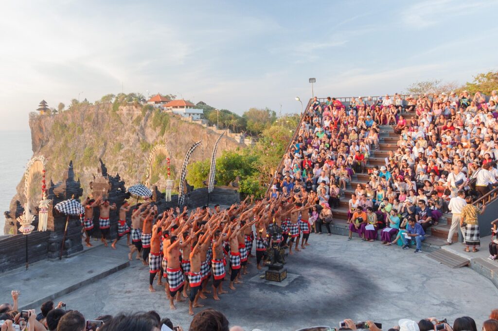 Balinese Kecak dancers performing at dusk.