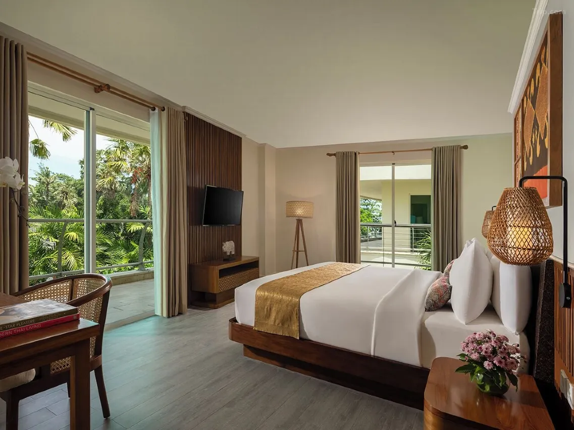 An overview of Anantara Vacation Club Legian, a resort with a large pool and ocean views.