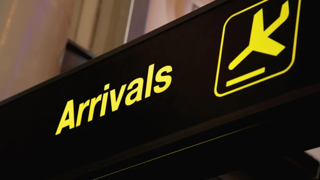 A sign for Arrivals at I Gusti Ngurah Rai International Airport in Bali.
