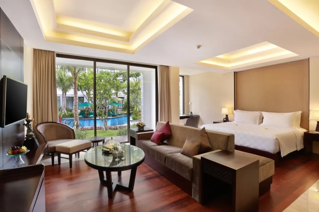 A luxurious shot of the Bali Nusa Dua Hotel and its swimming pool.
