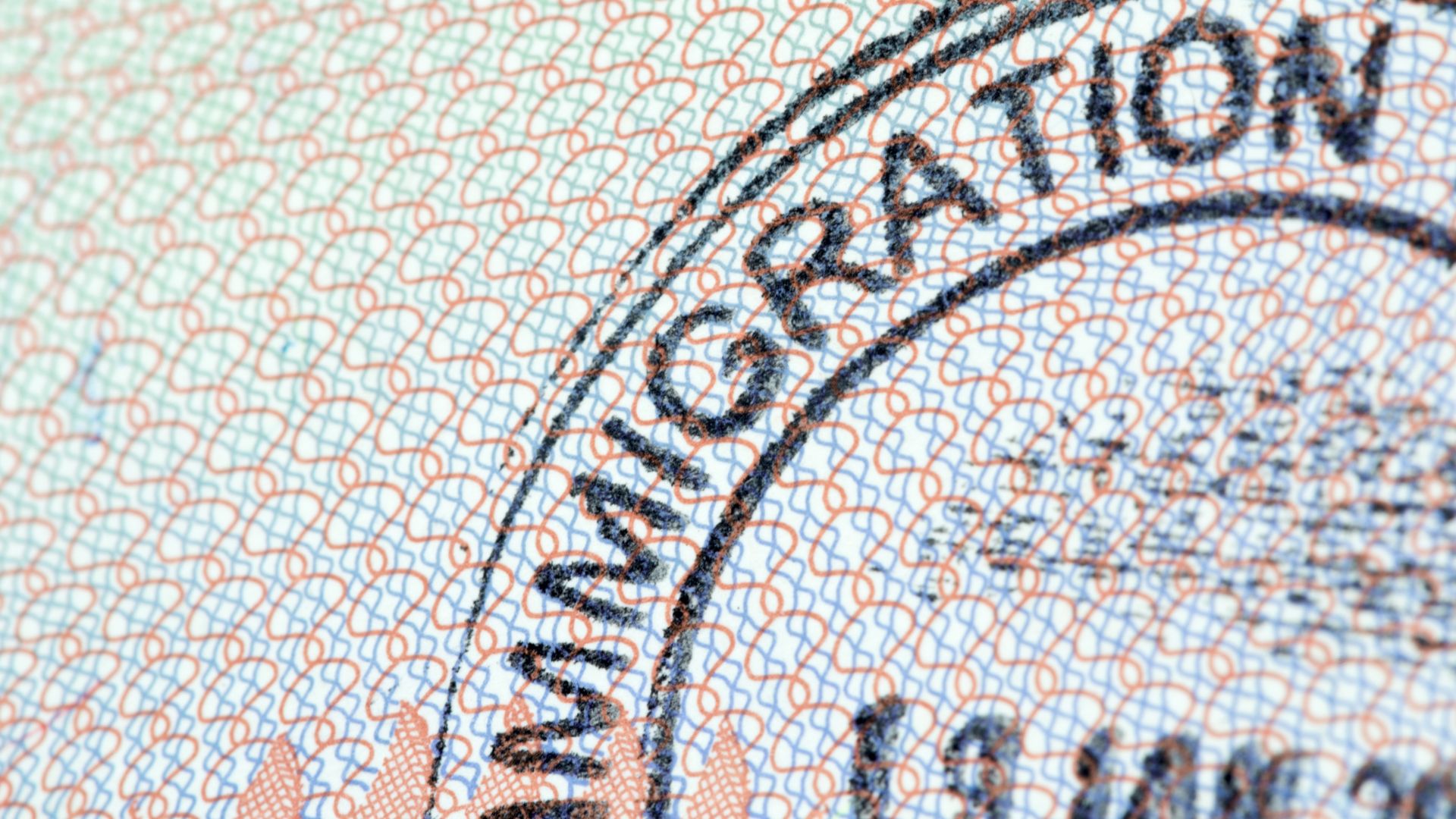 A passport page with the word Immigration written on it.