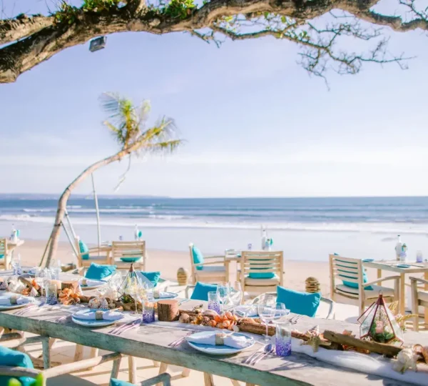 Beachfront Bali hotel with pool, private balcony, and free breakfast—tropical escape by the Indian Ocean.