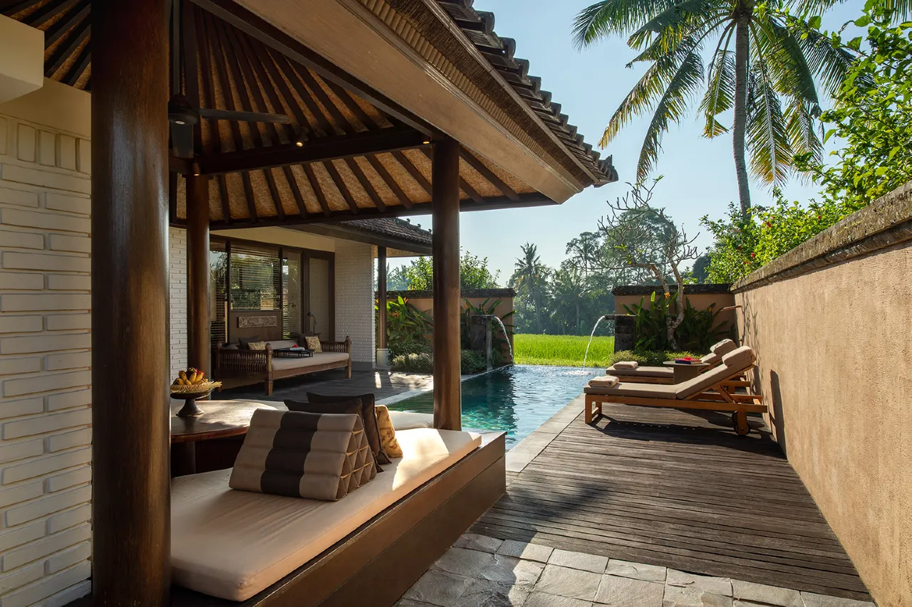 Boutique resort in Bali with luxury amenities and serene tropical surroundings and rice field views.