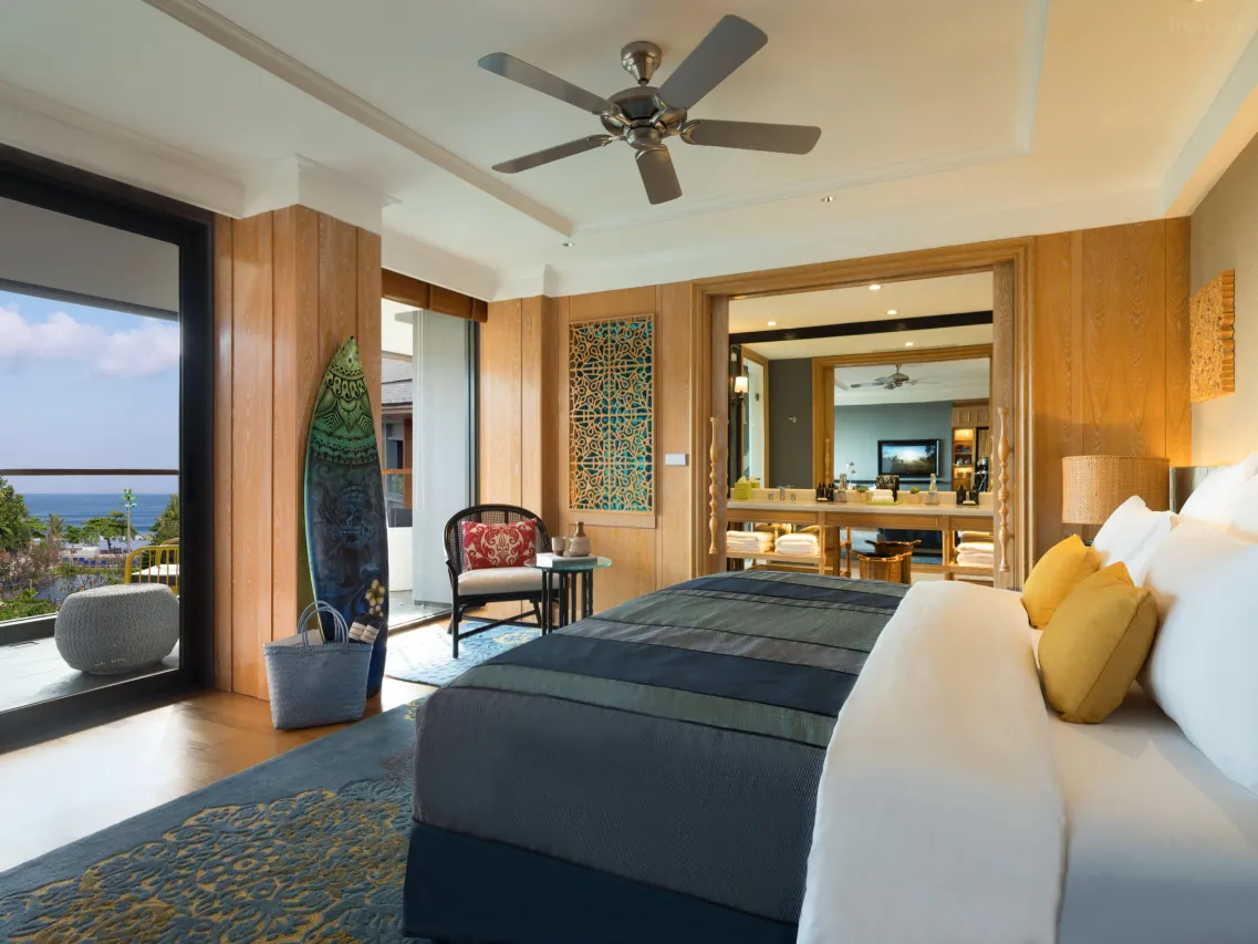 Modern and vibrant beachfront Hotel Indigo Bali Seminyak Beach with large swimming pools and stylish design.