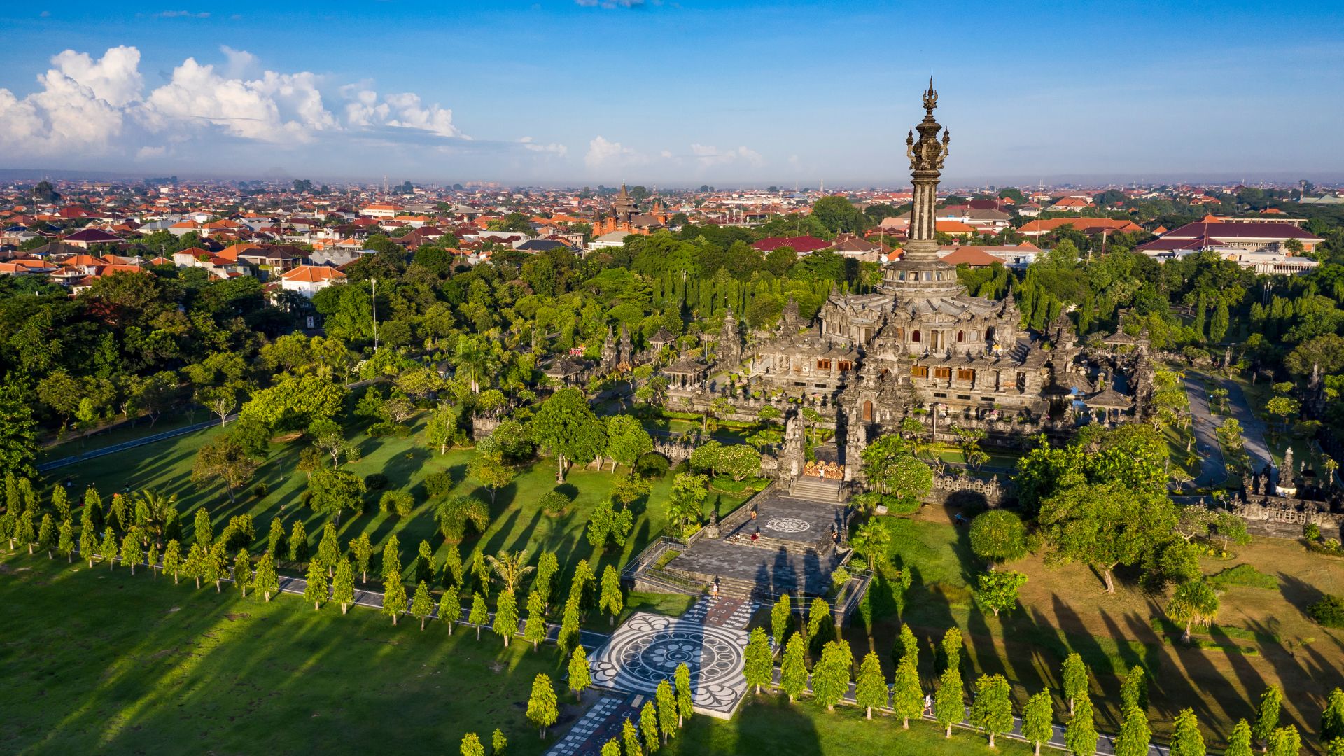 An aerial view of Denpasar city in Bali. Tourists think about the best transport to use during their trip.