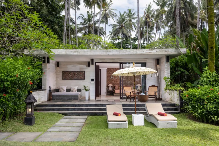Peaceful beachfront retreat in Tabanan, Bali, featuring private villas and free breakfast.