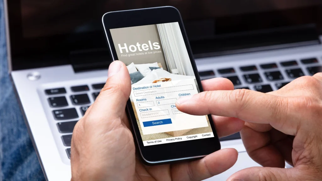 A traveler checking into a hotel in Bali after making a last-minute booking.