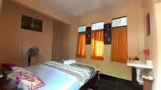 Family-run guesthouse in Ubud offering traditional Balinese hospitality and free breakfast.