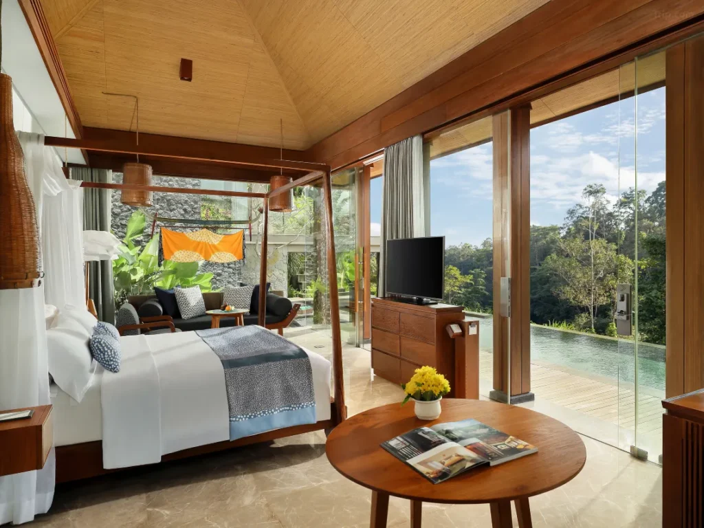 Maya Ubud Resort & Spa river valley pool, private balcony rooms, complimentary breakfast.