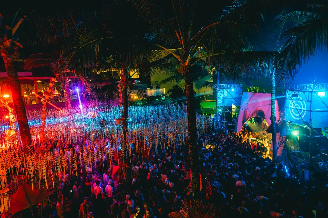 A vibrant scene of nightlife and bars in Seminyak, Bali, after dark.