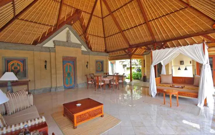 Traditional Balinese villa with a private pool at Puri Wulandari A Boutique Resort & Spa, surrounded by lush gardens.