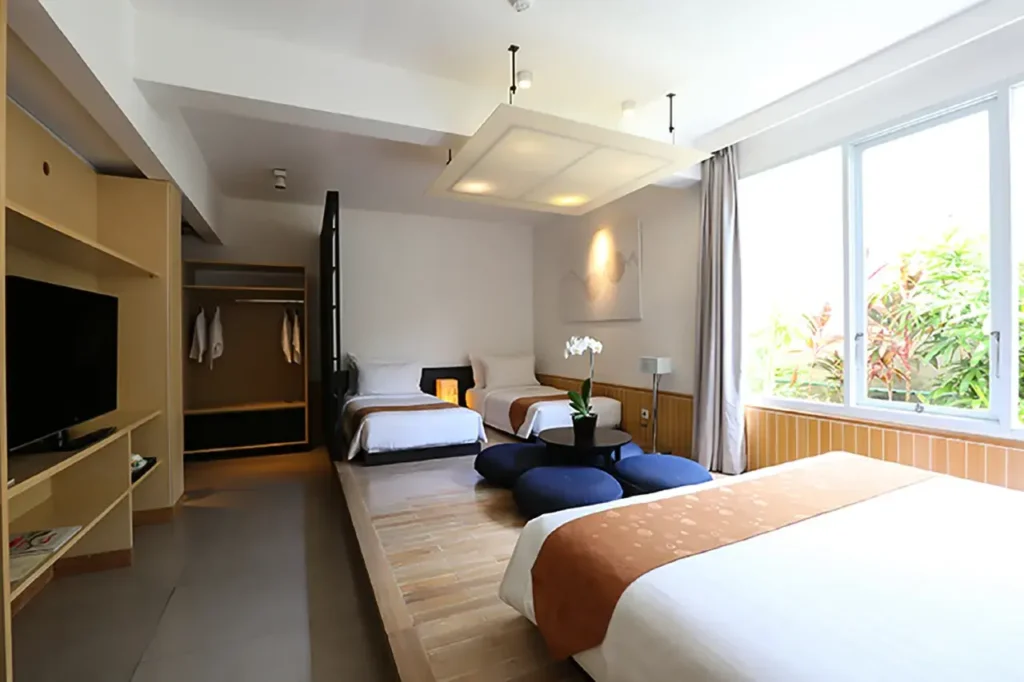 The 1O1 Seminyak rooftop bar with city views and lounge seating at a trendy Bali hotel.
