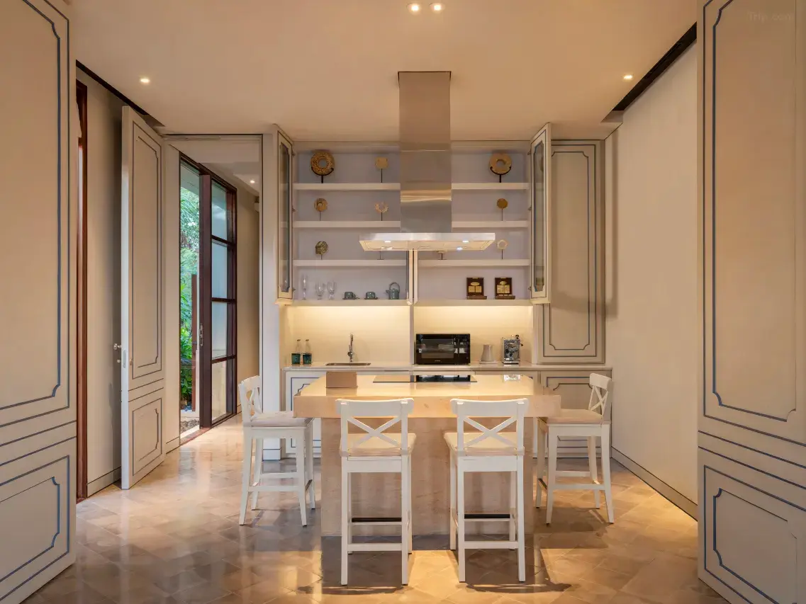 - Bali Adventours A modern and luxurious hotel kitchen, featuring high-end appliances and a sleek design in Jumeirah Bali villas luxury.