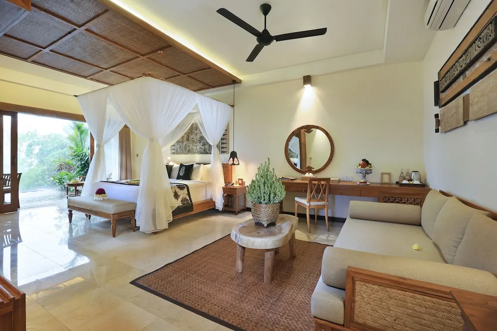 The Kayon Jungle Resort in Gianyar with multi-level infinity pools and jungle views.
