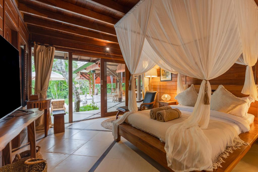 Villa Sungai in Canggu, Bali, offering boutique-style luxury. A private retreat ideal for work and leisure with personalized service.